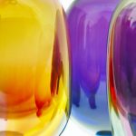 Multi colored vibrant curved crystal design. Colorful abstract background. Horizontal